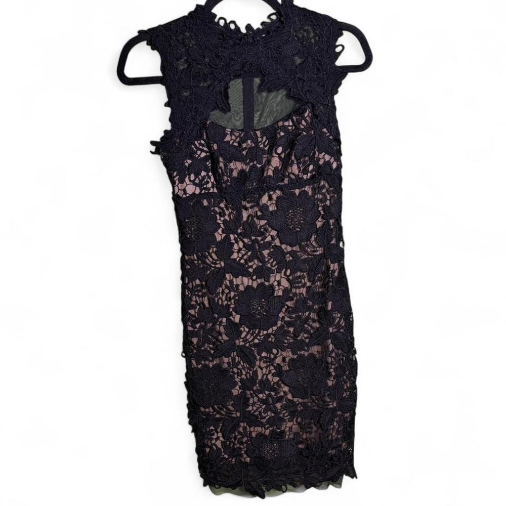 Betsy & Adam short black lace dress with tan slip underneath. Appx‎ size XS/S